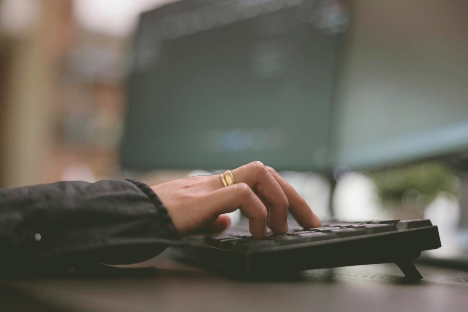 Banking analyst reviewing machine learning model output on screen